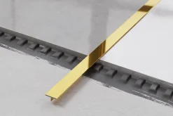 Ilcom Profilé Carrelage<Couvre-joint profilé décoratif Ts en inox rectifié Or poli - 15mm x 2700mm x 0,65 ep.