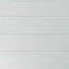 Vente-unique Porte De Garage Sectionnelle<Porte de garage sectionnelle effet rainuré blanc motorisée L254 x H218 cm - NORIA