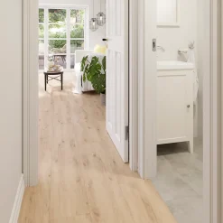 GoodHome Sol stratifié Lulea , passage élevé AC4, effet chêne blond, L.129,2 cm x l.24,6 cm x ép.8 mm, résistant à l'eau- Sol Stratifié